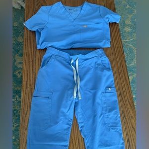 Figs, ceil blue scrubs